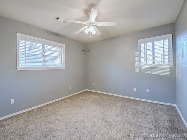 unfurnished room featuring carpet floors and ceiling fan