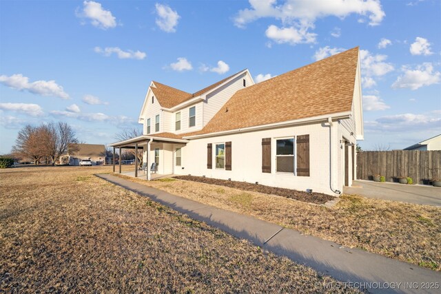 view of home's exterior featuring a porch