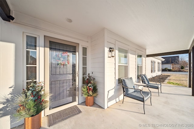 property entrance with a porch