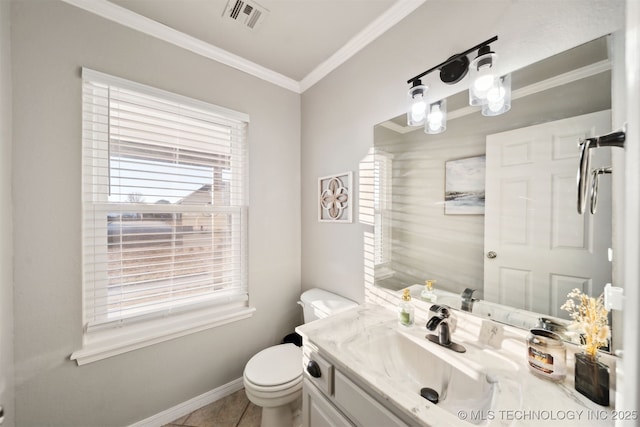 bathroom featuring tile patterned floors, vanity, toilet, and ornamental molding