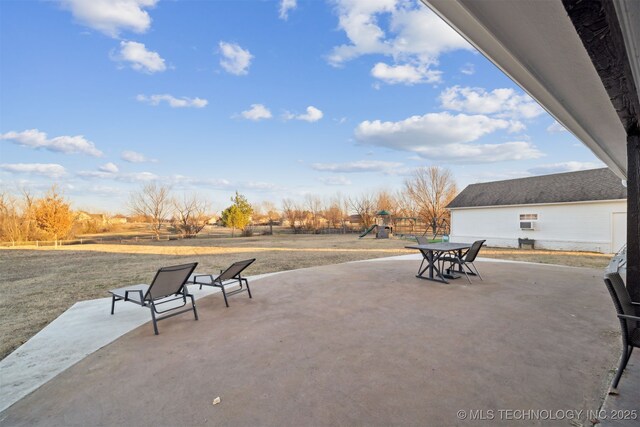 view of patio featuring a playground