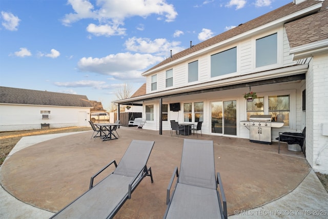 rear view of property with a patio