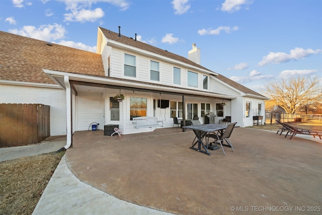 rear view of property featuring a patio