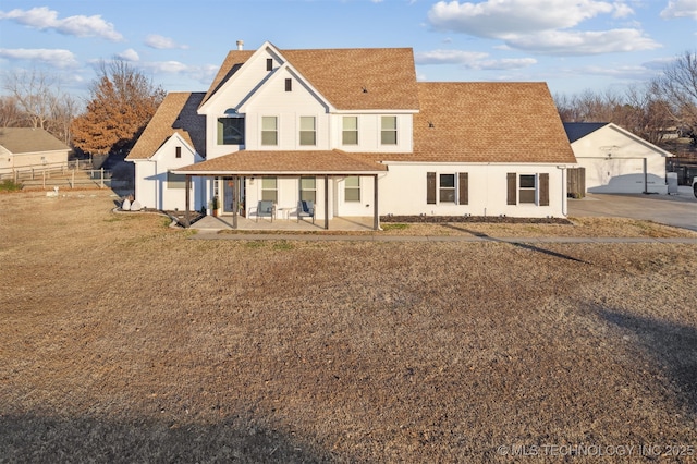 back of property featuring a patio area