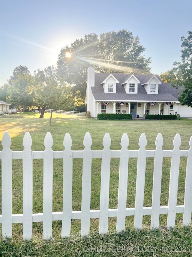 view of front of home with a front yard