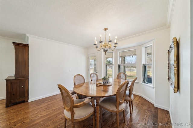 dining area featuring dark hardwood / wood-style floors, ornamental molding, and an inviting chandelier