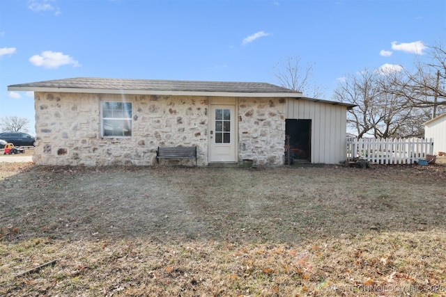11818 N Harvard Ave, Skiatook, OK 74070 - rear view of property featuring stone siding and board and batten siding
