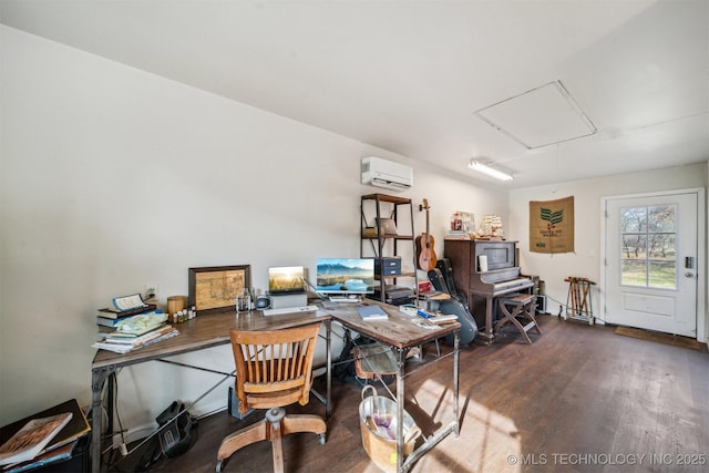 office area featuring a wall mounted air conditioner and dark hardwood / wood-style floors