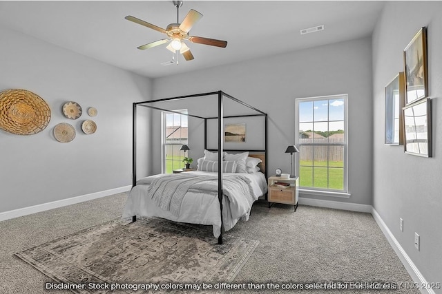 bedroom featuring carpet floors, visible vents, baseboards, and a ceiling fan