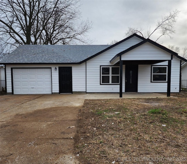 ranch-style house featuring a garage