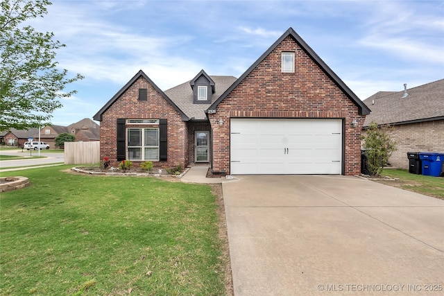 view of front facade featuring a front yard and a garage