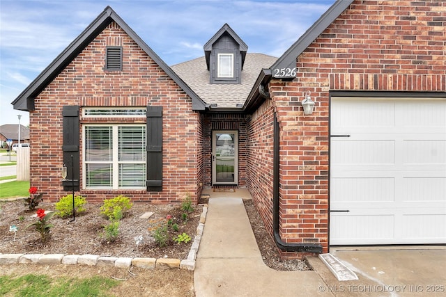 entrance to property with a garage