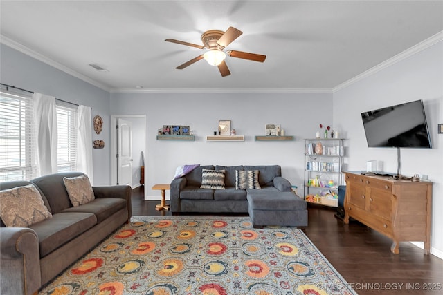 living room featuring dark hardwood / wood-style flooring, ceiling fan, and ornamental molding