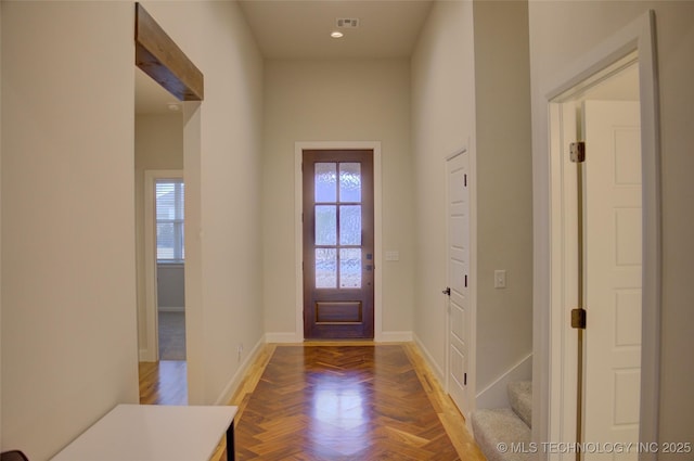 entrance foyer with parquet flooring