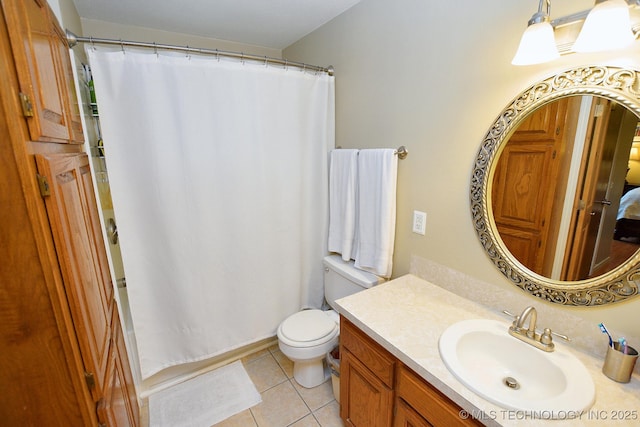 bathroom with tile patterned flooring, vanity, toilet, and a shower with curtain