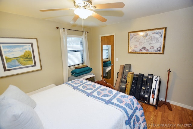 bedroom featuring ceiling fan and hardwood / wood-style floors