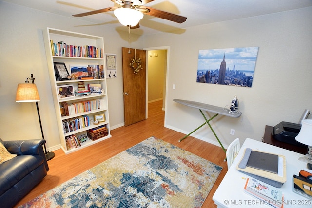 office featuring ceiling fan and wood-type flooring