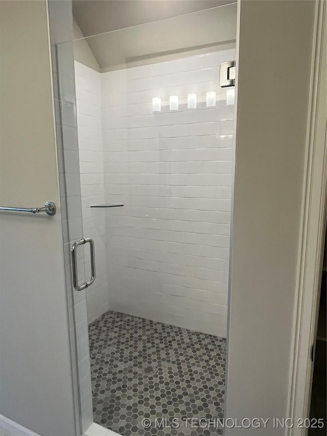 full bath featuring a stall shower