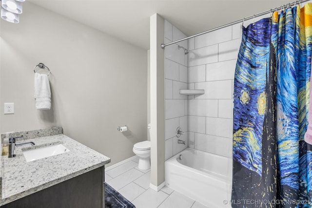 full bathroom featuring tile patterned floors, vanity, toilet, and shower / bath combo with shower curtain