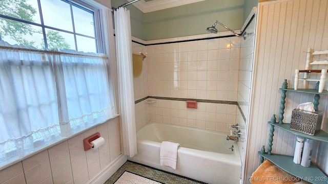 bathroom featuring tile patterned flooring and shower / tub combo