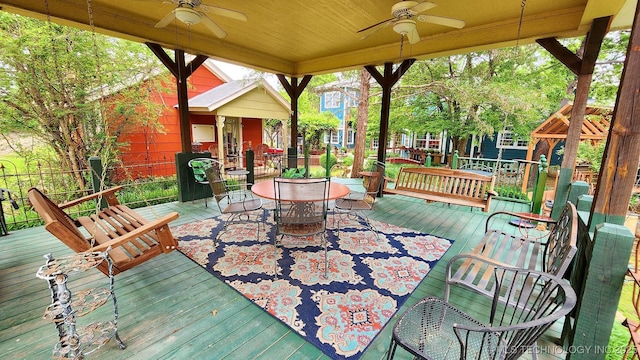 wooden terrace with ceiling fan