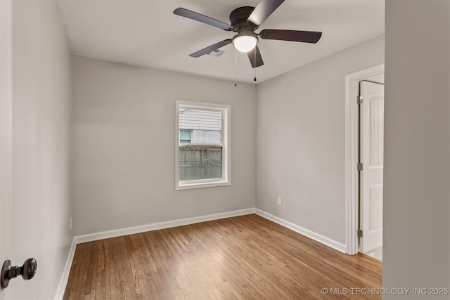 spare room with ceiling fan and light hardwood / wood-style floors