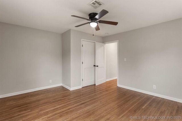 unfurnished bedroom with hardwood / wood-style flooring and ceiling fan