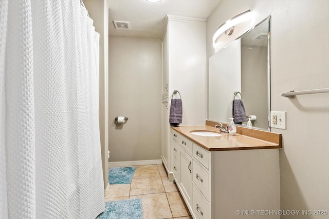 bathroom with curtained shower, crown molding, tile patterned flooring, and vanity