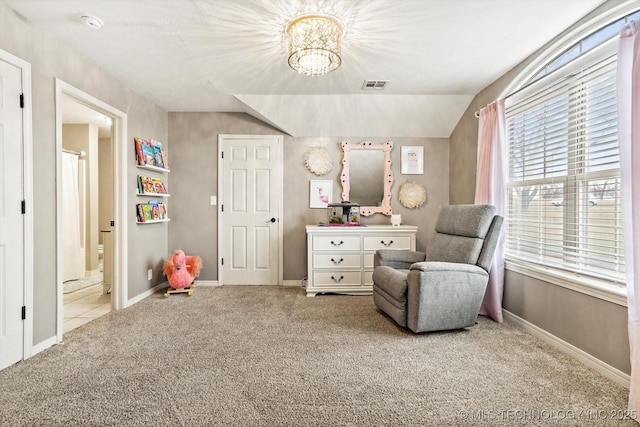 living area with light colored carpet and lofted ceiling