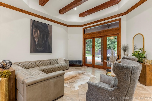 living room featuring crown molding and french doors