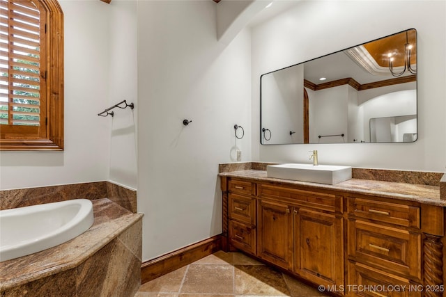 bathroom with vanity, a relaxing tiled tub, and ornamental molding