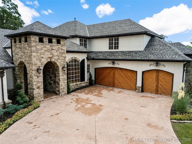 view of front of property featuring a garage