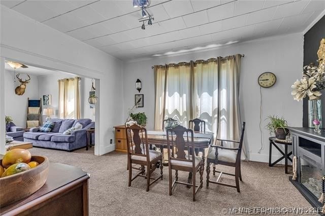 view of carpeted dining space