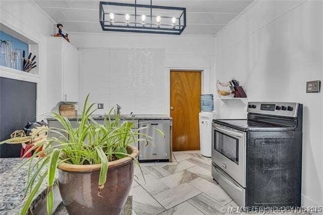 kitchen featuring electric stove and fridge