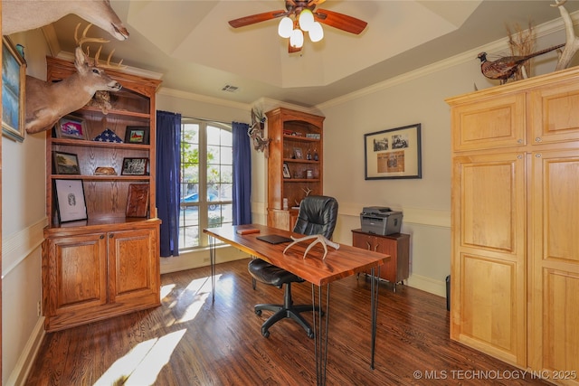 office featuring a raised ceiling, crown molding, and dark hardwood / wood-style floors