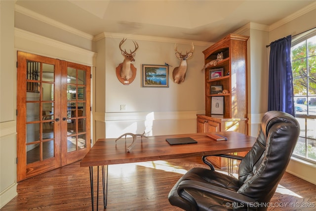 home office with a tray ceiling, french doors, dark hardwood / wood-style floors, and ornamental molding