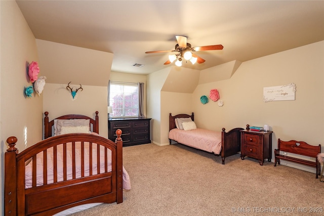 bedroom featuring ceiling fan, light colored carpet, and lofted ceiling