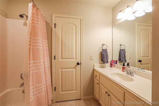 bathroom with tile patterned floors, shower / bath combination with curtain, and vanity