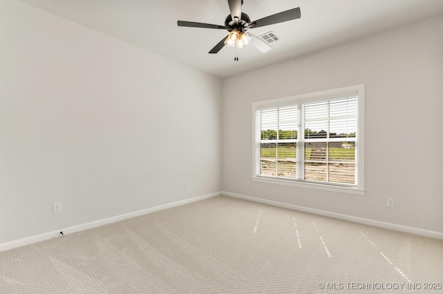 1303 Oakhurst Cir, Claremore, OK 74017 - spare room featuring baseboards, light colored carpet, and ceiling fan