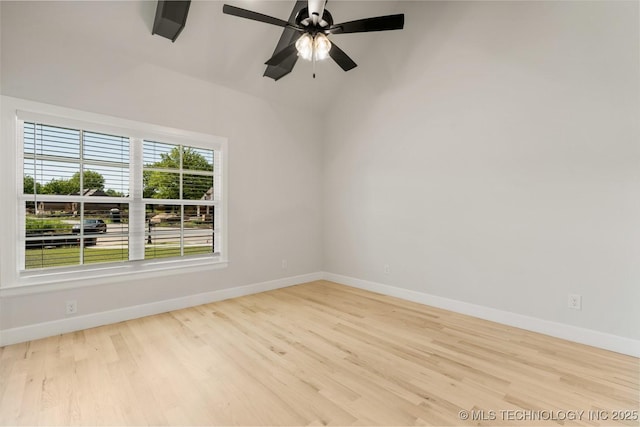 1303 Oakhurst Cir, Claremore, OK 74017 - empty room featuring baseboards, wood finished floors, a ceiling fan, and lofted ceiling