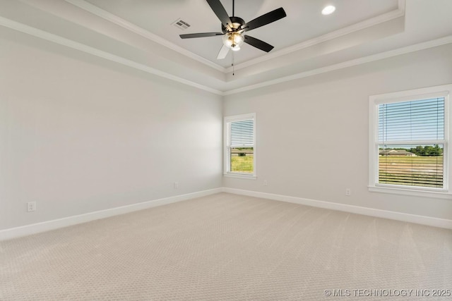 1303 Oakhurst Cir, Claremore, OK 74017 - empty room featuring a raised ceiling, ornamental molding, baseboards, light carpet, and recessed lighting