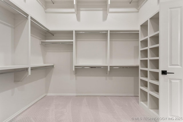 1303 Oakhurst Cir, Claremore, OK 74017 - spacious closet with carpet