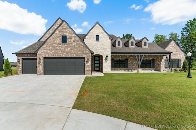 1303 Oakhurst Cir, Claremore, OK 74017 - french country inspired facade with concrete driveway, a front lawn, brick siding, and a shingled roof