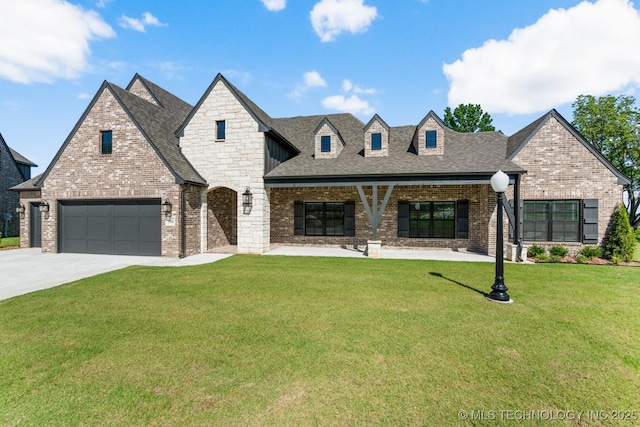 1303 Oakhurst Cir, Claremore, OK 74017 - french country inspired facade with a front lawn, concrete driveway, brick siding, and a garage