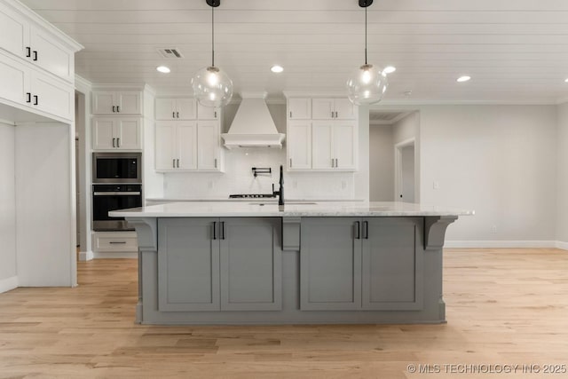 1303 Oakhurst Cir, Claremore, OK 74017 - kitchen featuring wall oven, custom range hood, white cabinets, a sink, and recessed lighting