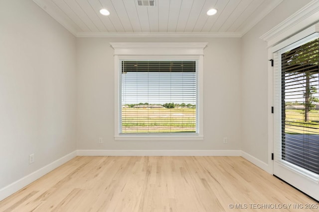 1303 Oakhurst Cir, Claremore, OK 74017 - empty room featuring crown molding, recessed lighting, wood finished floors, and baseboards