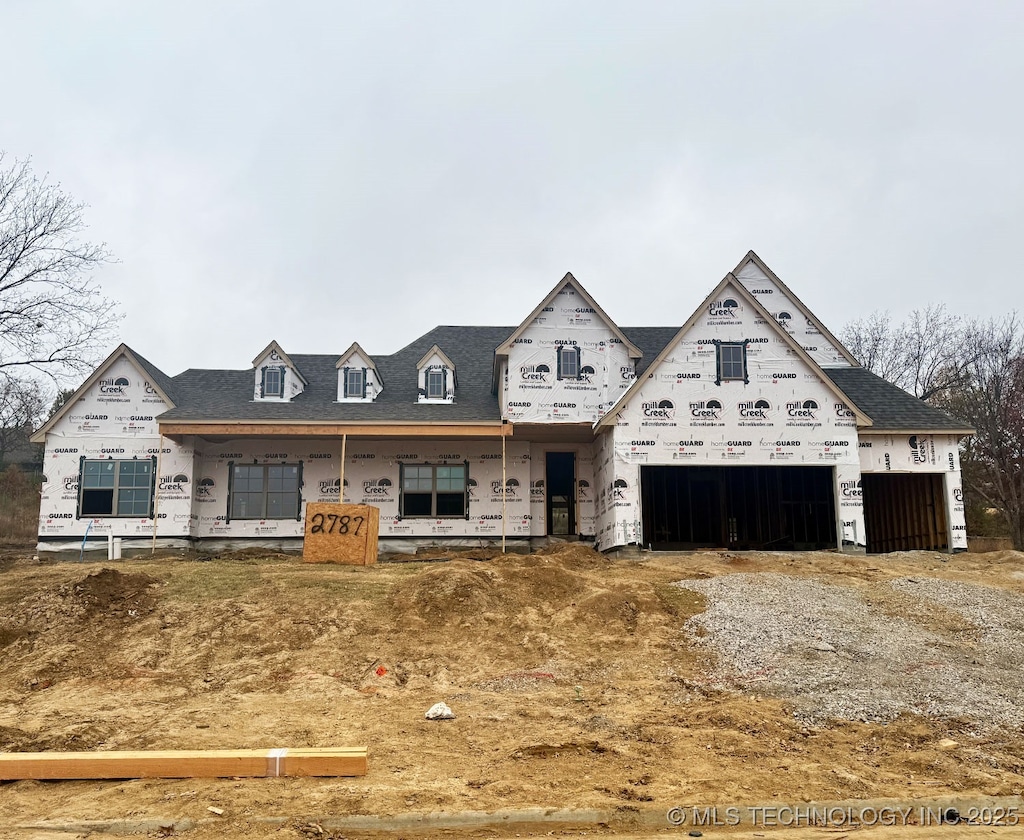 property under construction with a garage