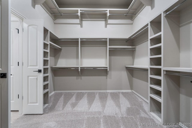 2787 Forest View Dr, Claremore, OK 74017 - spacious closet featuring carpet flooring