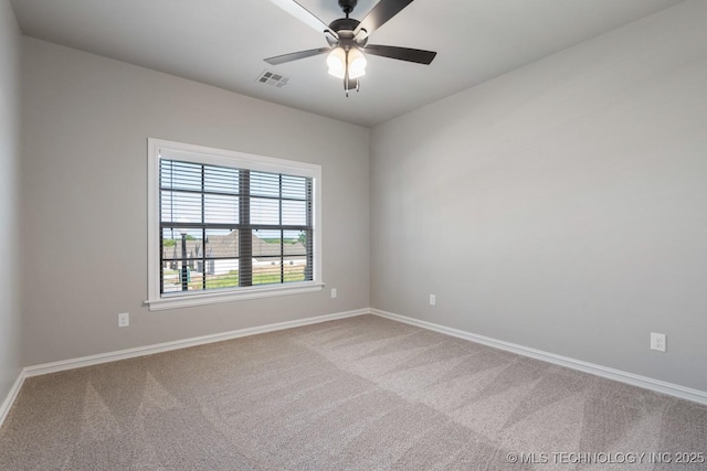 2787 Forest View Dr, Claremore, OK 74017 - spare room featuring carpet flooring, baseboards, and a ceiling fan