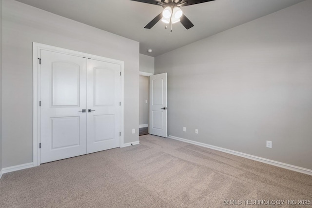 2787 Forest View Dr, Claremore, OK 74017 - unfurnished bedroom with carpet flooring, baseboards, a closet, and a ceiling fan